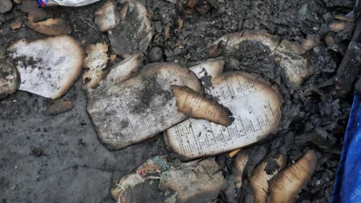 Image shows some burnt papers in Korail shanty town on Sunday, March 24, 2024. Photo: Ahadul Karim Khan/Dhaka Tribune