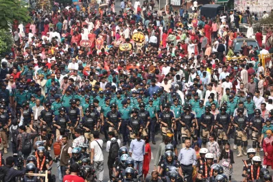 Members of Bangladesh Police and Rapid Action Battalion in Mongol Shobhajatra to provide safety for the participants on the occasion of Pohela Boishakh on Sunday, April 14, 2024. Photo: Ahadul Karim Ahad/Dhaka Tribune