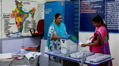 Polling officials work to set up a polling station at a school, a day ahead of the first phase of the election, at Tiruvannamalai in Tamil Nadu, India, on Friday, April 18, 2024. Photo: Reuters