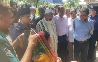 The image shows Religious Affairs Minister Md Faridul Haque Khan visiting the house of victim of mob beating in Faridpur, on Saturday, April 20, 2024. Photo: UNBnnaddressing a meeting at the conference room of the deputy commissioner`s office in Faridpur on Saturday, April 20, 2024. Photo: Dhaka Tribune