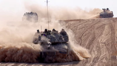 Israeli army battle tanks operate in southern Israel near the border with the Gaza Strip on May 29, 2024, amid the ongoing conflict in the Palestinian territory between Israel and the Hamas movement. Photo: AFP