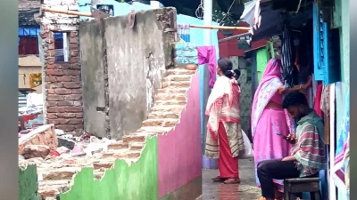 The image shows the demolished wall at Mironjilla Sweeper Colony under DSCC in Old Dhaka. Photo: Dhaka Tribune