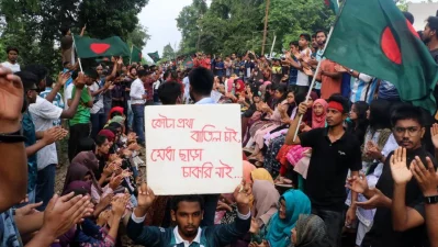 The image shows Rajshahi University students protesting by blocking the railway in the city on Friday, July 12, 2024. Photo: Bangla Tribune