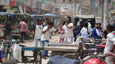An attack takes place while quota reform protestors hold a march in Naogaon on Thursday, July 18, 2024. Photo: Dhaka Tribune