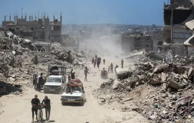 Displaced Palestinians return to Bani Suhayla and neighbouring towns east of Khan Yunis following reports of Israeli forces withdrawing from the area in the southern Gaza Strip on July 30, 2024. Photo: AFP