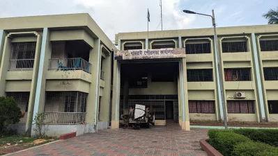 A damaged vehicle is pictured on the premises of the Dhamrai municipality building on Sunday, August 18, 2024. Photo: Dhaka Tribune