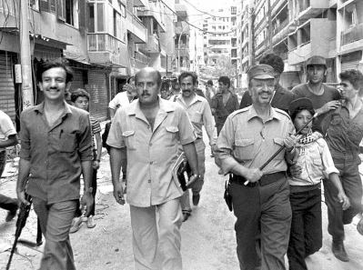 File image: Palestinian leader Yasser Arafat, right, is seen with his supporters in Beirut during the early days of the 1982 Israeli invasion of Lebanon. Photo: AFP