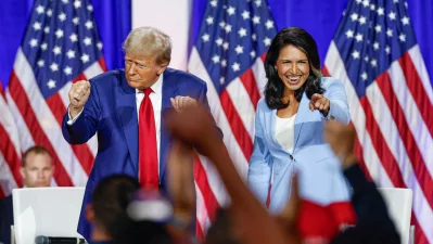 Donald Trump, left, dances as he leaves the stage after speaking alongside Tulsi Gabbard during a town hall meeting in La Crosse, Wisconsin, on August 29, 2024. Photo: AFP