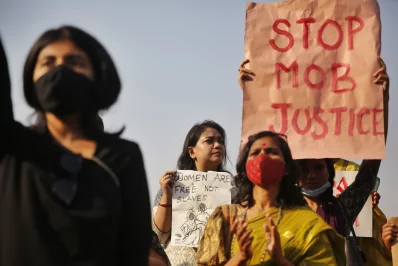 Women protest outside Dhakas National Parliament against violence and harassment, demanding the removal of Home Affairs Adviser Jahangir Alam Chowdhury, Friday, March 7, 2025. Photo: Mehedi Hasan/ Dhaka Tribune