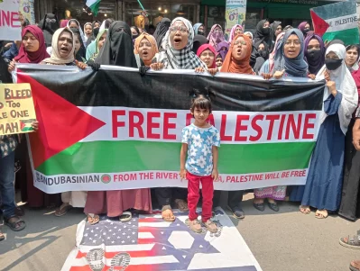 People stage a protest at Tangail, denouncing the Israeli assault on Palestine and calling for justice and peace. Photo: Dhaka Tribune