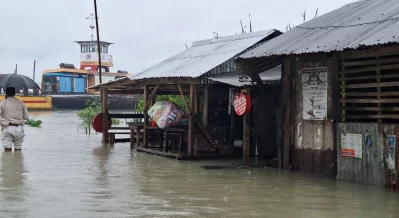 Heavy rainfall and a tidal surge triggered by a low-pressure system over the Bay of Bengal have submerged low-lying areas across Barguna. Photo: Dhaka Tribune