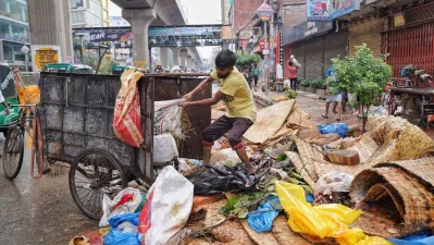 Cleaners at work in Dhaka as part of the citywide drive to remove Eid-ul-Azha sacrificial waste. Photo: Ahadul Karim Khan/Dhaka Tribune