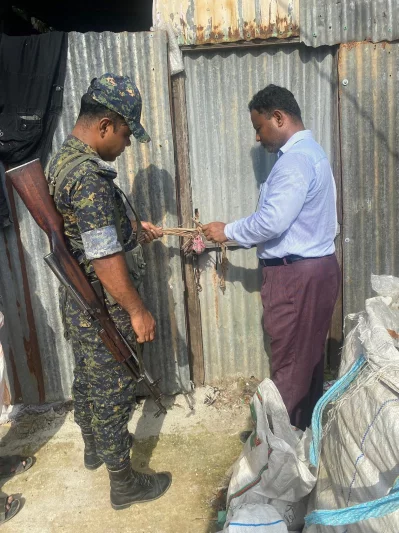 Executive Magistrate Ishtiak Ahmed, with Kapasia Police, sealed the illegal polythene factory during a raid on Thursday, June 12, 2025. Photo: Dhaka Tribune