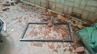 The image shows intruders threw bricks and stones from outside, breaking several windows. Photo: Dhaka Tribune