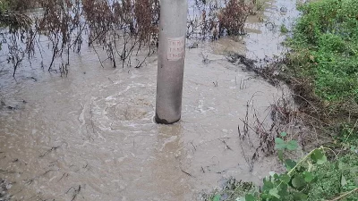 The gas pipeline in Shibpur area of Tangail Sadar upazila ruptured beneath this electric pole. Photo: Dhaka Tribune