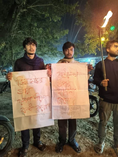 JU students hold torch rally over Baul, minority attacks. Photo: Dhaka Tribune