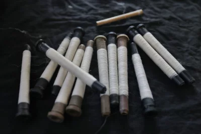 Bobbins wound with thread. Photo: Dhaka Tribune