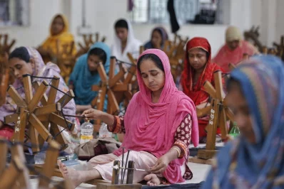 Women spinning cotton at Charkas. Photo: Dhaka Tribune