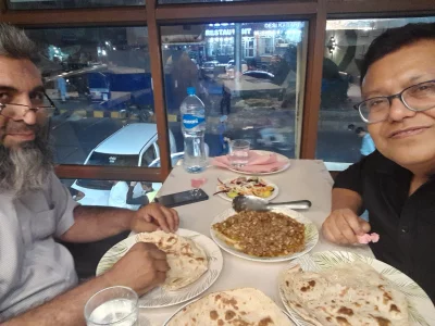 A delicious dish of Kata-kat (also known as Tak-a-tak), a wonderfully spiced, minced meat dish cooked on a flat griddle. Pairing it with fresh, warm flatbread right by the window makes for a perfect dining experience in the eateries at Lakshmi Chowk in Lahore