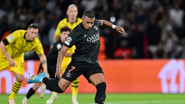 PSG 2-0 Dortmund: Kylian Mbappe continues sparkling scoring form with  penalty in Champions League win