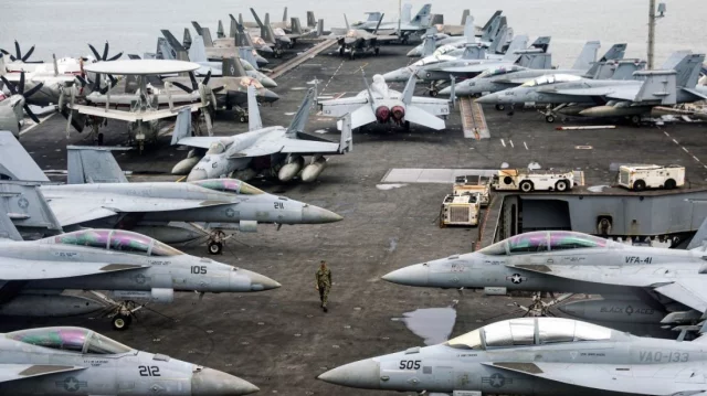 US deploys aircraft carrier as Iran warns against attack