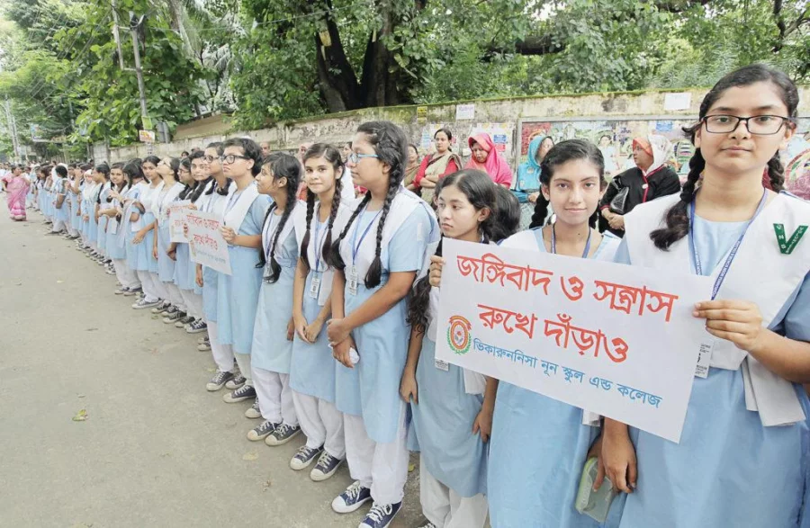 Students of Viqarunnisa Noon School and College form a human chain in Dhaka's Bailey Road