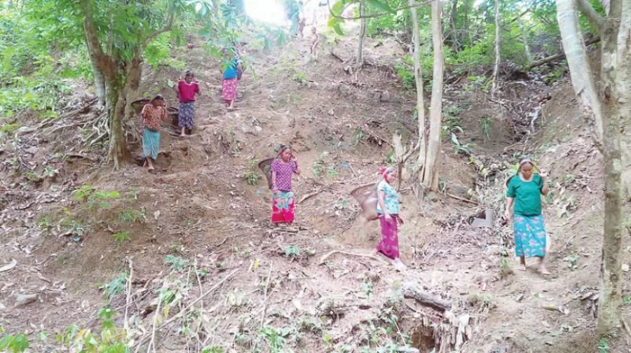 Earlier, they had to walk a long distance through forests and hills to collect water from a waterfall  Photo: Dhaka Tribune