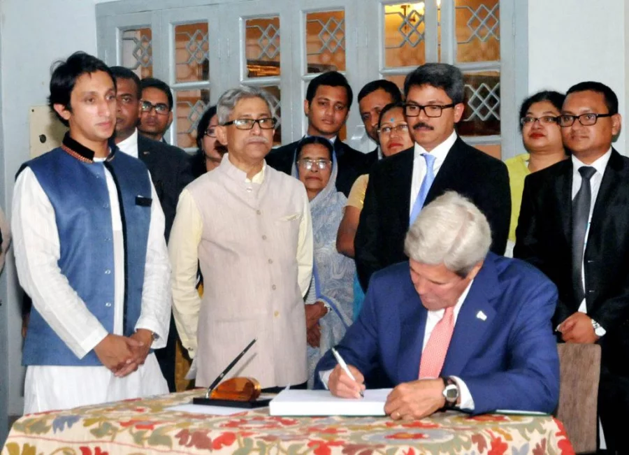 US Secretary of State John Kerry writes his observation about Bangbandhu in the comment book at Bangabandhu Memorial Museum at Dhanmondi 32 during his visit to it on August 29, 2016 . Focus Bangla