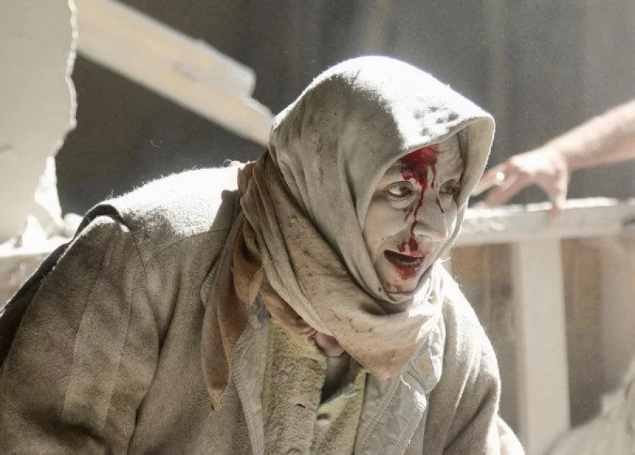 A woman injured in an airstrike on Thursday in Aleppo. Reuters