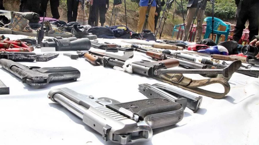 Police's elite force RAB recover three AK22 rifles among other firearms and bullets from a militant den in a remote area of Lotmoni hill under Banshkhali upazila, Chittagong on February 22, 2015