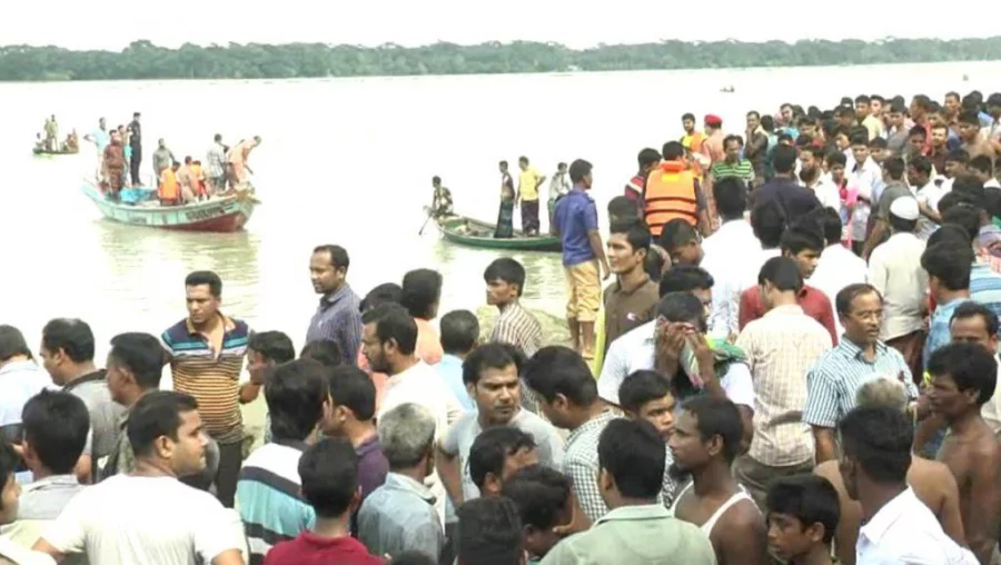 Locals join hands with fire fighters to rescue passengers of the launch that capsized Wednesday morning