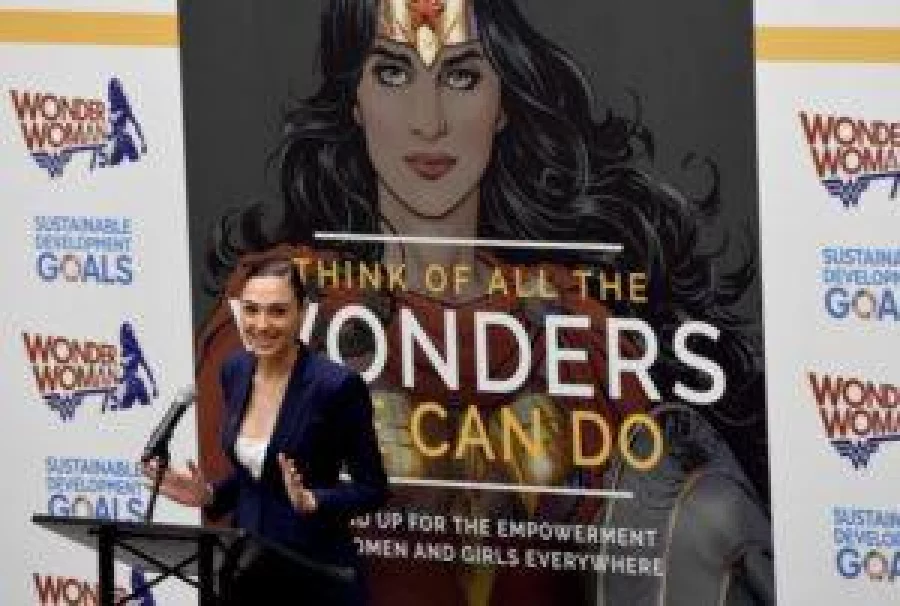 Actress Gal Gadot speaks during a ceremony as the UN names the comic character Wonder Woman its Honorary Ambassador for the Empowerment of Women and Girls during a ceremony at the United Nations Economic and Social Council Chamber on October 21, 2016, in New York. Gadot plays Wonder Woman in the film to be released in 2017. The honorary title comes as Wonder Woman turns 75 years old. / AFP PHOTO / TIMOTHY A. CLARY