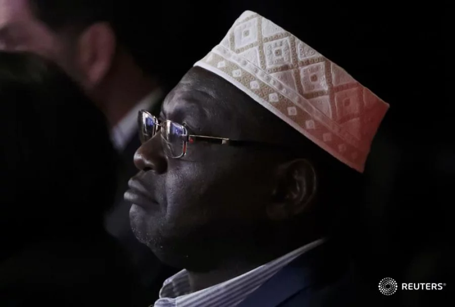 President Barack Obama's half brother Malik, a guest of Donald Trump, sits in the crowd. REUTERS/Carlos Barria 