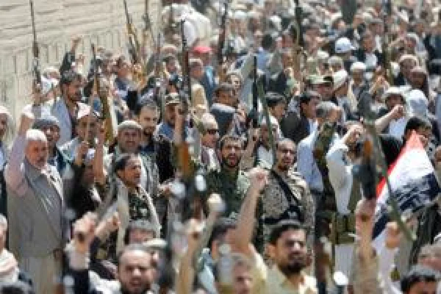 Armed people demonstrate outside UN offices in Yemen