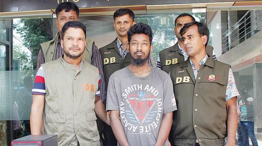 Top leader of militant group Junud At-Tawheed Wal Khilafah Abdullah Al Ghalib is produced before media after his arrest on May 21, 2015