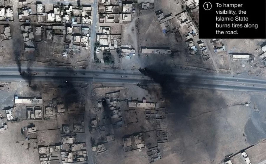 Smoke is seen in this satellite image of the city of Mosul in Iraq on October 18, 2016. Courtesy of Stratfor.com/AllSource Analysis/DigitalGlobe/Handout via REUTERS