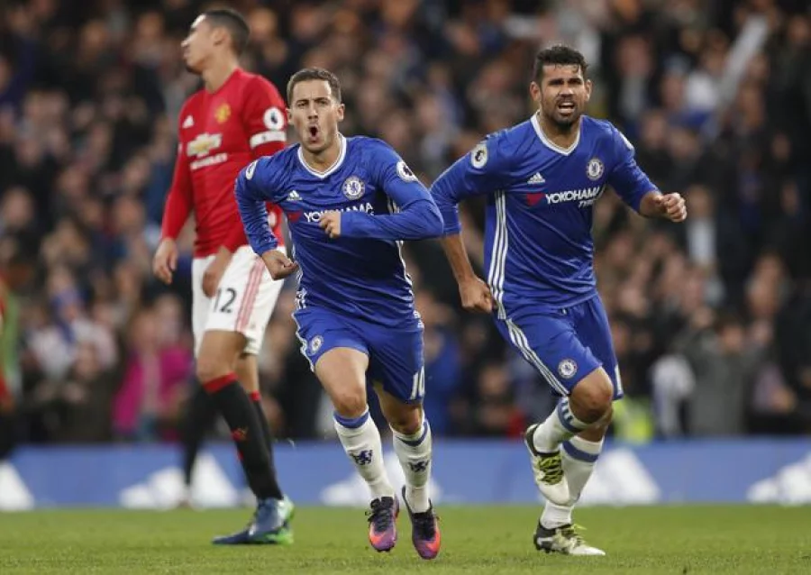 Britain Soccer Football - Chelsea v Manchester United - Premier League - Stamford Bridge - 23/10/16 Chelsea's Eden Hazard celebrates scoring their third goal with Diego Costa Action Images via Reuters / John Sibley Livepic EDITORIAL USE ONLY. No use with unauthorized audio, video, data, fixture lists, club/league logos or "live" services. Online in-match use limited to 45 images, no video emulation. No use in betting, games or single club/league/player publications.  Please contact your account representative for further details.