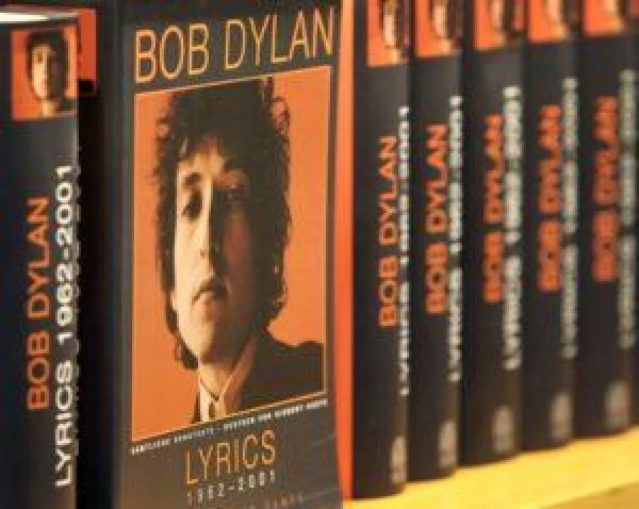 Books of the 2016 Literature Nobel Price winner US Bob Dylan are pictured at the booth of publisher Hoffman und Campe at the Frankfurt Book Fair in Frankfurt/Main, Germany, on October 19, 2016. The five-day Frankfurt fair, which opens to the public on October 19, is the world's largest publishing event. / AFP PHOTO / AMELIE QUERFURTH