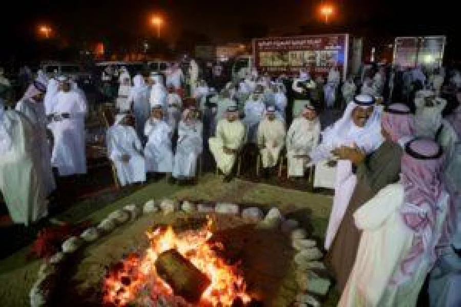Kuwaitis attend an election campaign meeting for the upcoming parliamentary election, in Kuwait City late on November 23, 2016.   / AFP PHOTO / Yasser Al-Zayyat