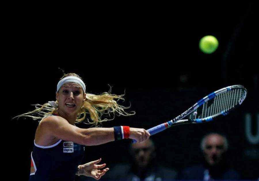Tennis - Singapore WTA Finals Singles Finals - Singapore Indoor Stadium, Singapore - 30/10/2016 - Dominika Cibulkova of Slovakia in action against Angelique Kerber of Germany. REUTERS/Edgar Su