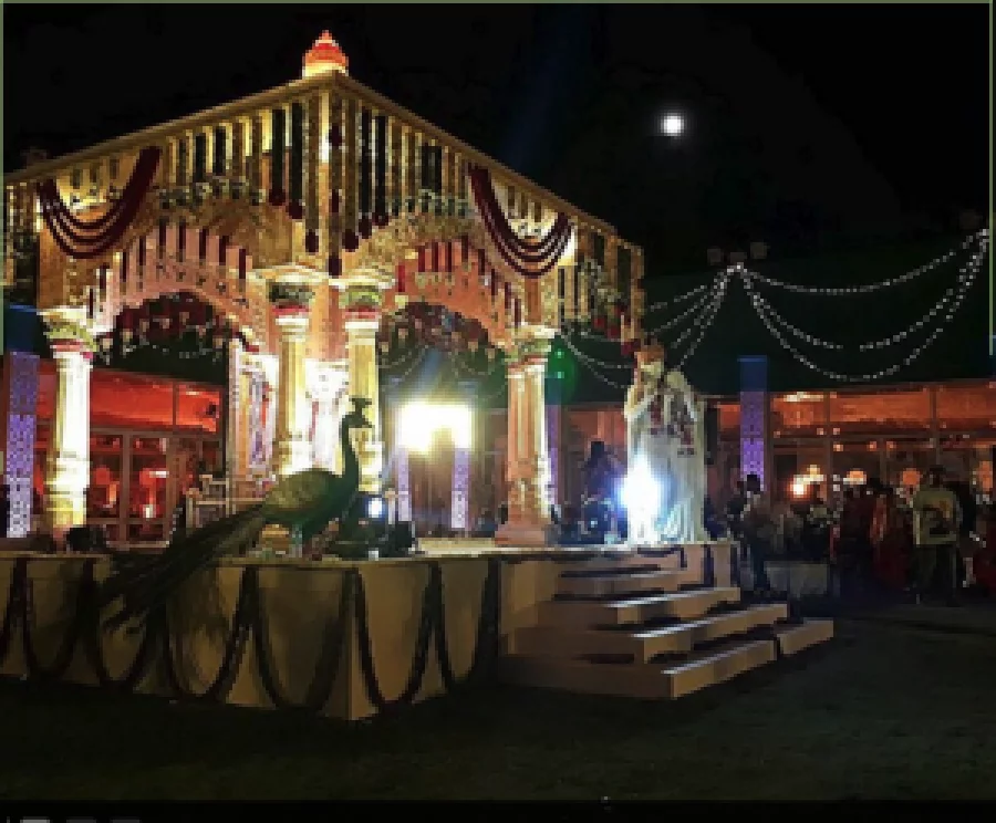At the wedding venue, at least a dozen different sets of the kind you see in big-budget films are being constructed at the grounds. Rumour has it that Bollywood art directors Sujeet Sawant and Sriram Iyengar have been roped in to create the sets. The main set-piece is a recreation of a Vijayanagara-style palace. ET