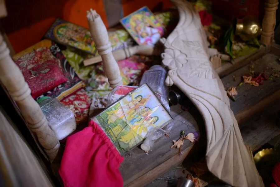 Shattered glass cover and frame of a Lord Krishna illustration lies on top a broken furniture and other unfocused illustration in similar state. The photo was taken on Friday, November 4, 2016; after the second wave of communal attack in different villages of Brahmanbaria's Nasirnagar upazila, triggering fresh panic among the Hindus in the upazila Mahmud Hossain Opu/Dhaka Tribune  