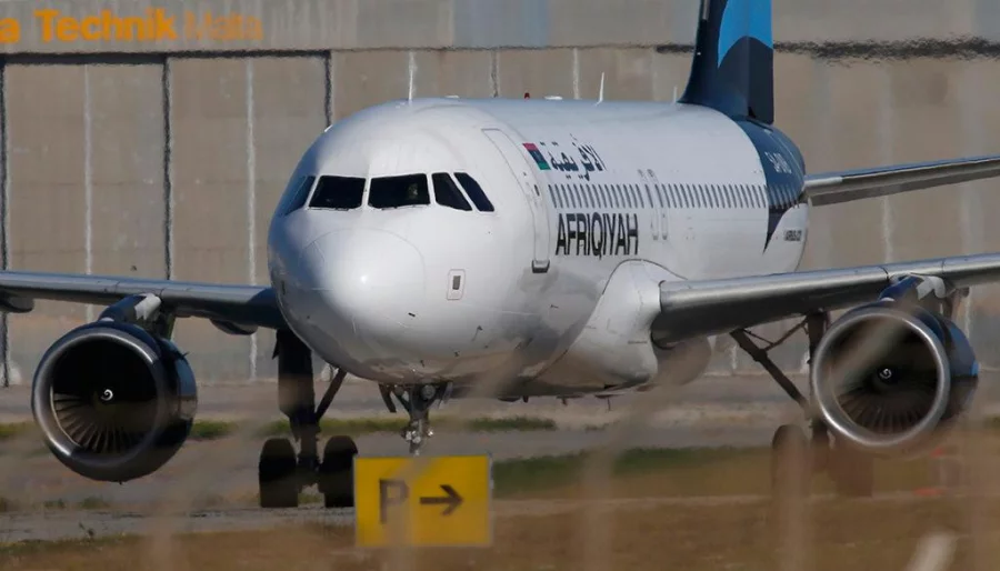 A hijacked Libyan Afriqiyah Airways Airbus A320 stands on the runway at Malta Airport, December 23, 2016 Reuters