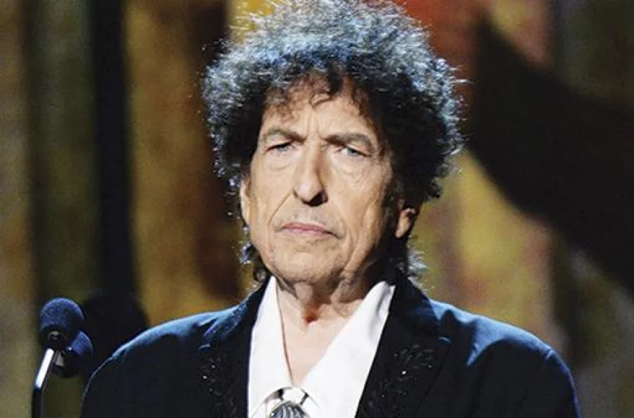 LOS ANGELES, CA - FEBRUARY 06: Bob Dylan speaks onstage at the 25th anniversary MusiCares 2015 Person Of The Year Gala honoring Bob Dylan at the Los Angeles Convention Center on February 6, 2015 in Los Angeles, California. The annual benefit raises critical funds for MusiCares' Emergency Financial Assistance and Addiction Recovery programs. For more information visit musicares.org. (Photo by Kevin Mazur/WireImage)