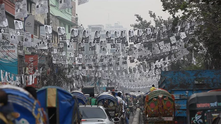 A town completely covered by campaigning poster poster Dhaka Tribune