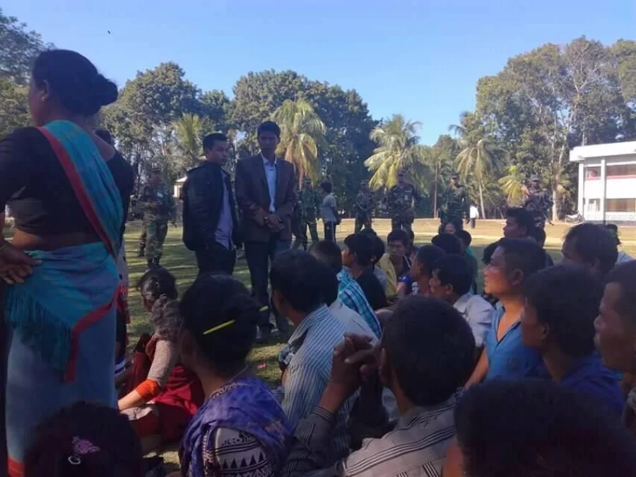 Protesters take a breather in the shade after a day of demonstration Collected