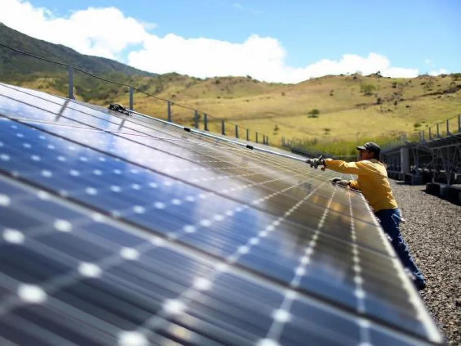 A worker cleans the panels in a solar power park run by the Costa Rican Electricity Institute (ICE) on March 26, 2015 in Guanacaste, Costa Rica Joe Raedle/Getty Images