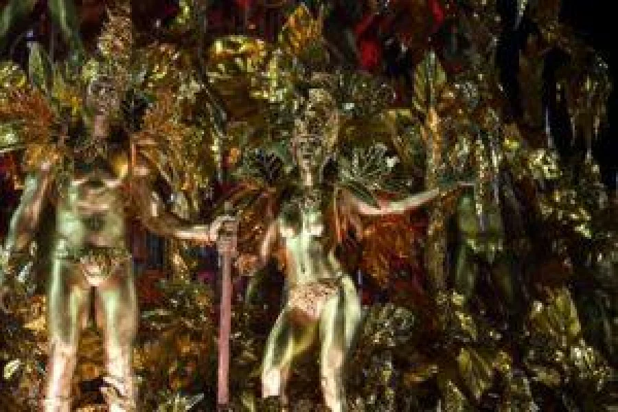 Revellers of the Portela samba school perform on the second night of Rio's Carnival at the Sambadrome in Rio de Janeiro, Brazil, early on February 28, 2017. / AFP PHOTO / Vanderlei ALMEIDA