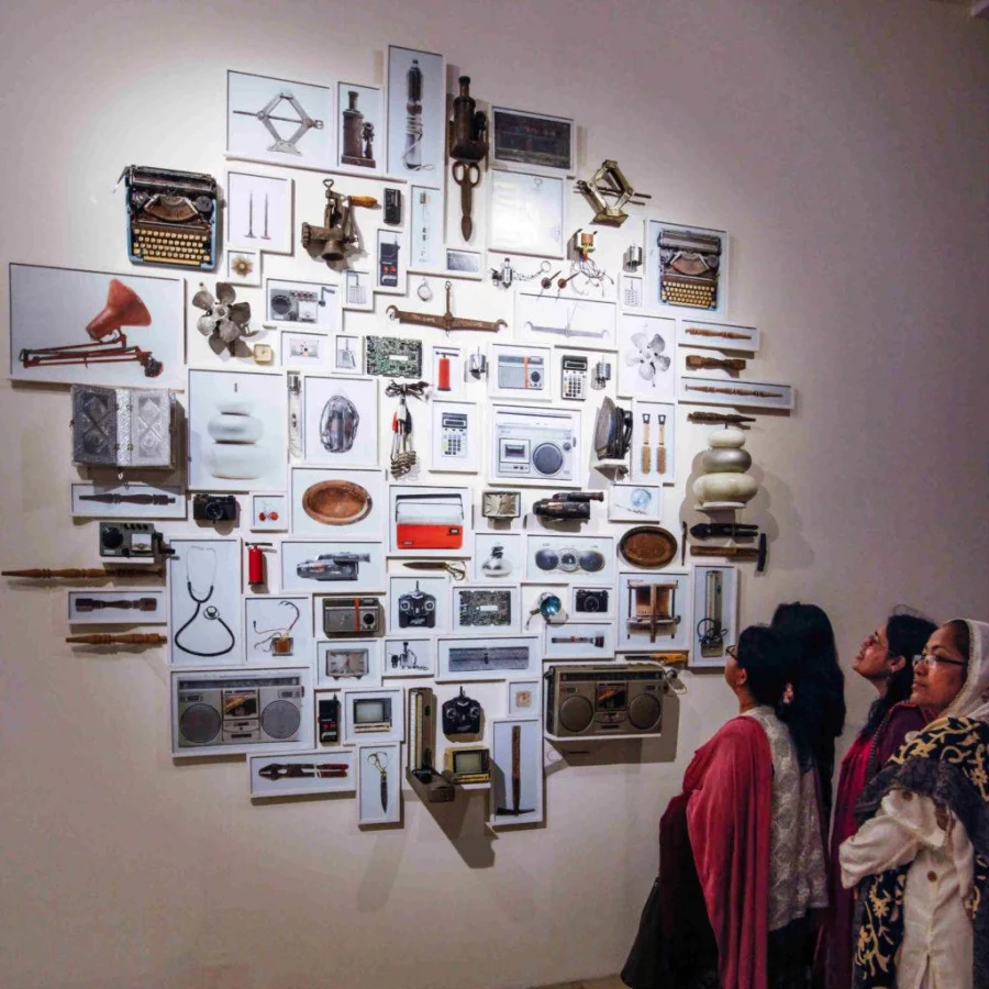 Visitors looking at the exhibit at CHobi Mela IX, Photo: Mahmud Hossain 