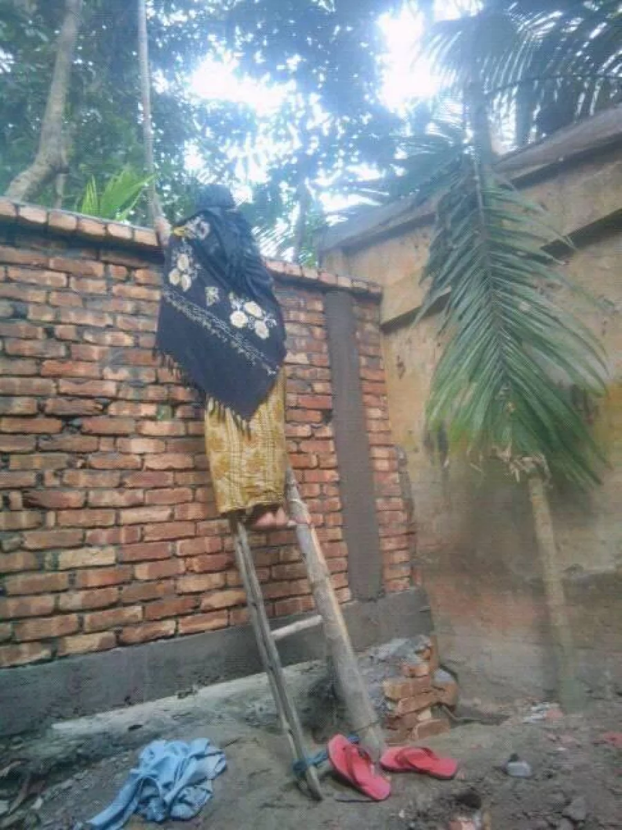 Some younger ones are using ladders to cross it Dhaka Tribune